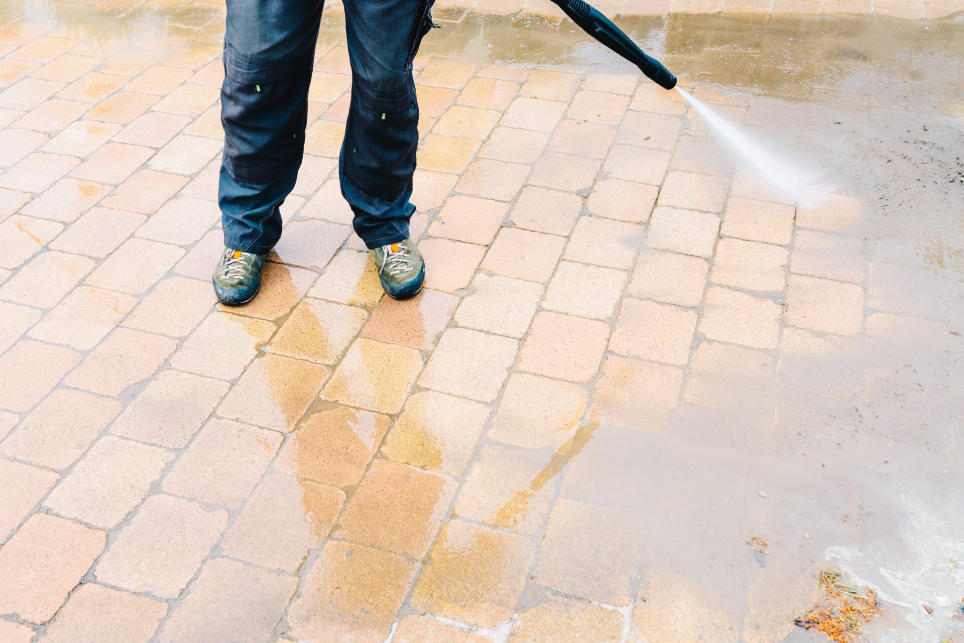 Outdoor floor cleaning with high pressure water jet